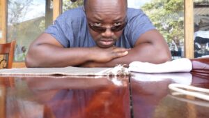 Man at desk-Liberia Improves on Mental Health